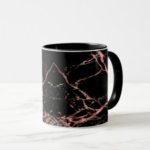 Schwarze Kaffeetasse mit rosa-goldenem Marmoreffek