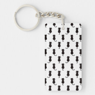 Schwarze Katze Abgeschieden auf weißem Polka-Dot-M Schlüsselanhänger