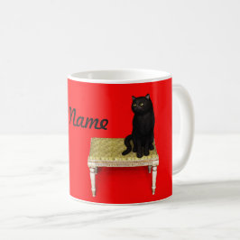 Schwarze Katze auf dem Hocker Kaffeetasse