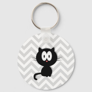 Schwarze Katze auf grauem Zickzack Schlüsselanhänger