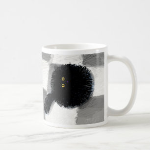 Schwarze Katze, die oben schaut Kaffeetasse