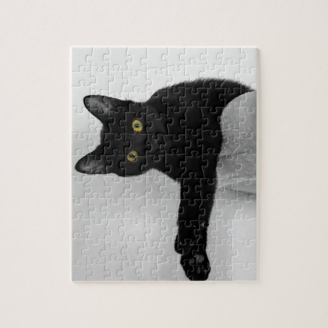 Schwarze Katze entspannen auf dem Sofa Puzzle (Vertikal)
