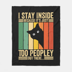 Schwarze Katze Ich bleibe drinnen, weil es zu viel Fleecedecke