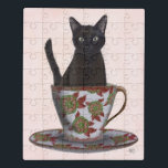Schwarze Katze im Teacup Puzzle<br><div class="desc">Black Cat in Teacup von FabFunky. Eine Katze sitzt in einem wunderschönen Blumenteacup. | 191544D</div>