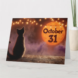 Schwarze Katze mit "Oktober 31" Halloween-Mond Karte