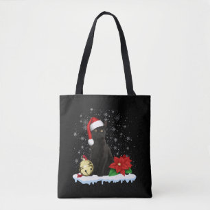 Schwarze Katze mit Weihnachtskostüm der Weihnachts