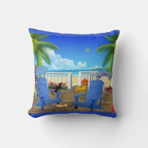 Schwarze Katze und Strandkissen