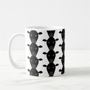 Schwarze Kühe auf Tasse