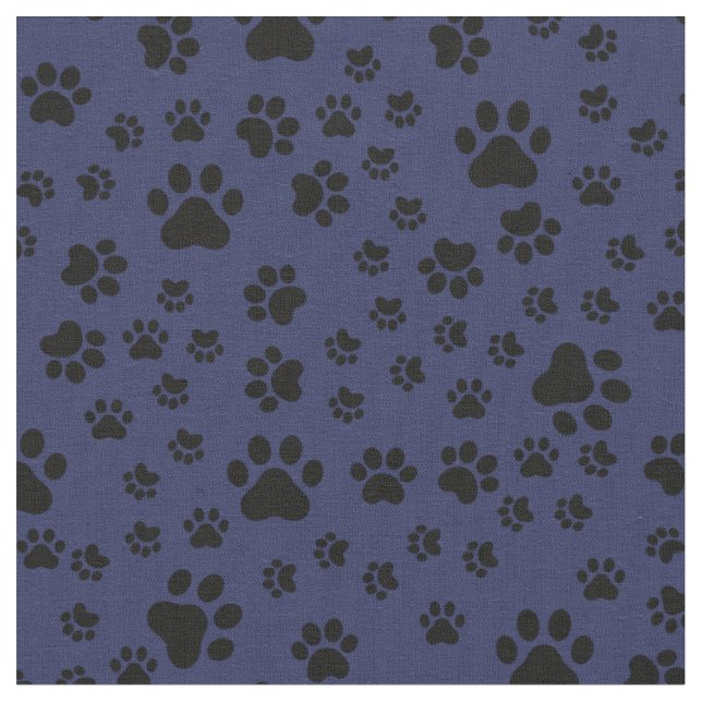 Schwarze Paw-Prints auf dunkelblau Stoff (Nahaufnahme)