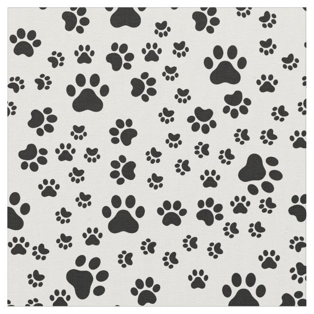Schwarze Paw-Prints auf Weiß Stoff (Nahaufnahme)