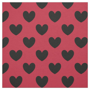 Schwarze Polka Herzen auf rot Stoff