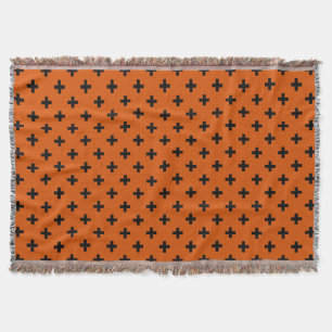 Schwarze Polka-Kreuze auf Orange Decke