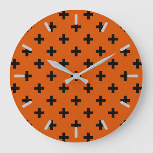 Schwarze Polka-Kreuze auf Orange Große Wanduhr