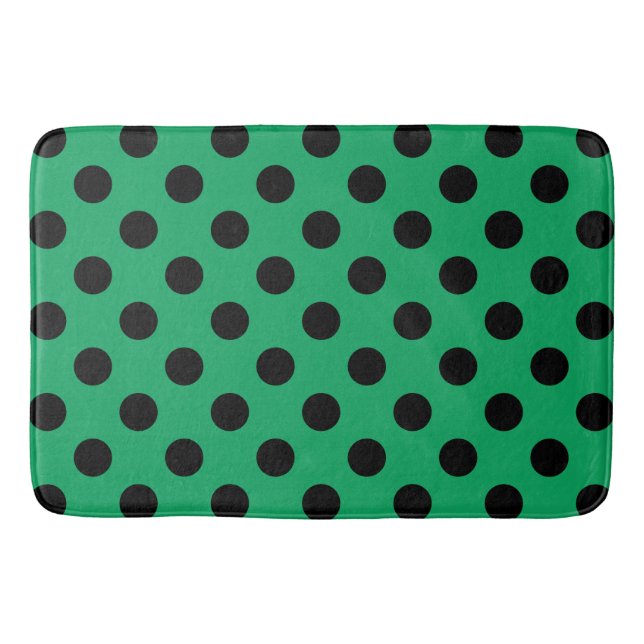 Schwarze Polka Punkte auf frisch grünem Badematte (Vorderseite)