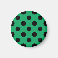 Schwarze Polka Punkte auf frisch grünem