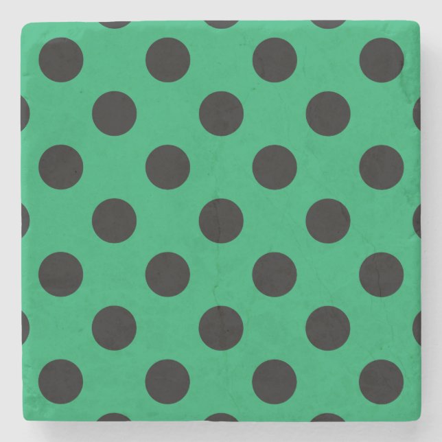 Schwarze Polka Punkte auf frisch grünem Steinuntersetzer (Vorderseite)
