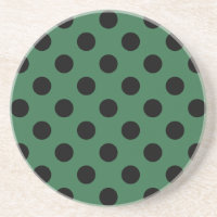 Schwarze Polka-Punkte auf kelgrün