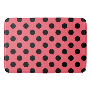 Schwarze Polka Punkte auf Korallen Badematte