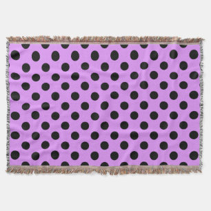 Schwarze Polka-Punkte auf Lila Decke