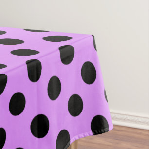 Schwarze Polka-Punkte auf Lila Tischdecke