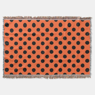 Schwarze Polka-Punkte auf Orange Decke