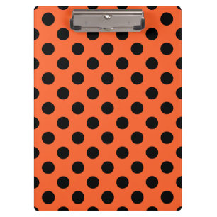 Schwarze Polka-Punkte auf Orange Klemmbrett