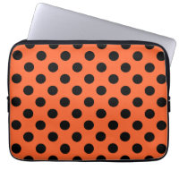 Schwarze Polka-Punkte auf Orange