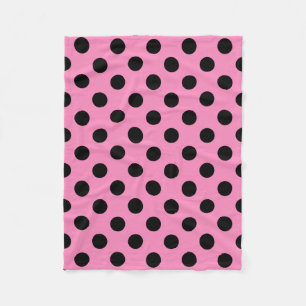 Schwarze Polka-Punkte auf Rosa Fleecedecke