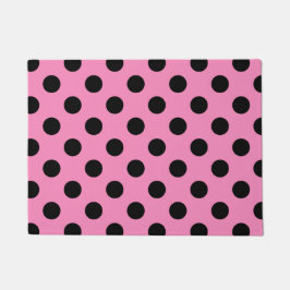 Schwarze Polka-Punkte auf Rosa Fußmatte