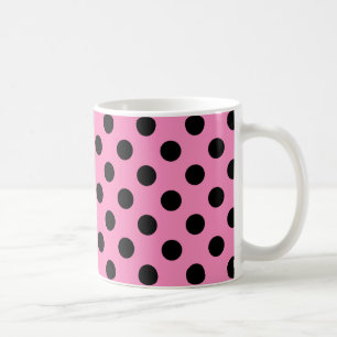 Schwarze Polka-Punkte auf Rosa Kaffeetasse