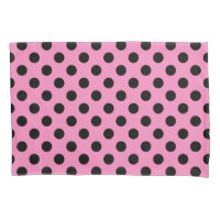 Schwarze Polka-Punkte auf Rosa