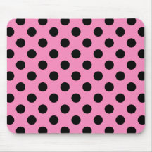 Schwarze Polka-Punkte auf Rosa