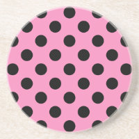 Schwarze Polka-Punkte auf Rosa