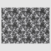 Schwarze Rose und Skulpturen im weißen Dekoupage