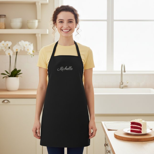 Schwarze Schürze mit Individuelle Name (Personalized black kitchen apron with a custom name.)