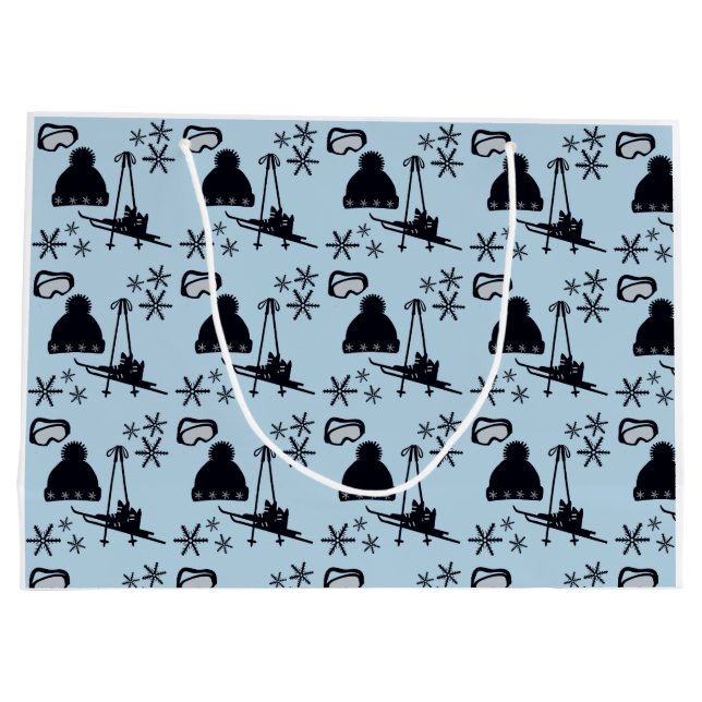 Schwarze Skiausrüstung und Schneeflocken auf blau Große Geschenktüte (Rückseite)