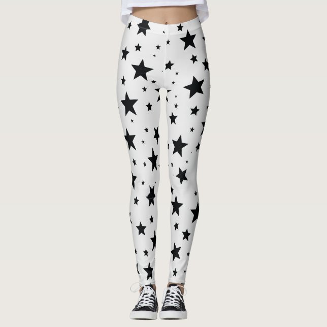 Schwarze Sterne im weißen Hintergrund Leggings (Vorderseite)