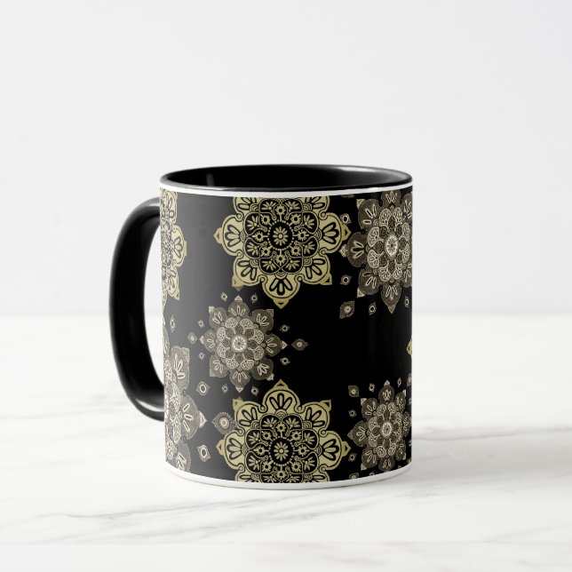 Schwarze Tasse mit Goldmedaillen (Vorderseite Links)