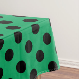 Schwarze Tupfen auf frischem Grün Tischdecke
