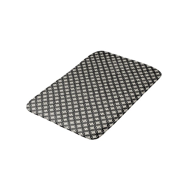 Schwarze und beige Badematte (Schrägansicht)