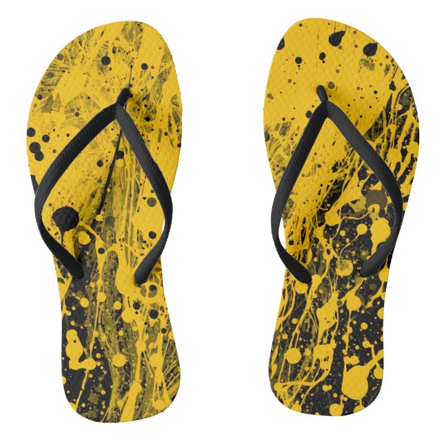 Schwarze und gelbe Flip-Flops mit Farbspritzern Flip Flops (Fußbett)