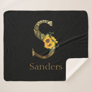 Schwarze und goldene Buchstaben S Sonnenblumen Sherpadecke