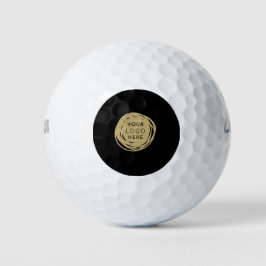 Schwarze und goldene Firmenlogos Golfball