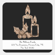 Schwarze und goldene Kerze mit Heiligabend