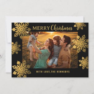 Schwarze und goldene Schneeflocke Frohe Weihnachte Feiertagskarte