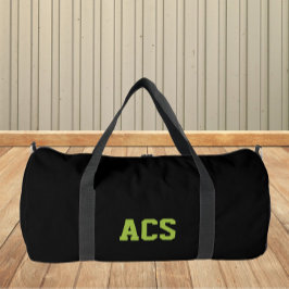 Schwarze und grüne Schulfarben und Buchstaben Duffle Bag