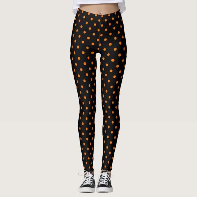 Schwarze und orangefarbene Polka-Punkte Leggings (Vorderseite)