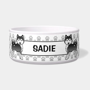 Schwarze und weiße Alaskan Malamute Hunde und Name Napf