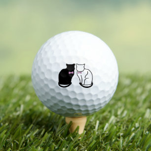 Schwarze und weiße Katze Golfball