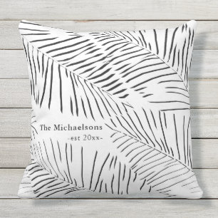 Schwarze und weiße Palmen mit Familienname und Jah Kissen